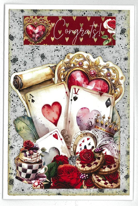 Red Queen card sample featuring ornate heart frame with playing cards showing Ace of Hearts and Ace of Spades, checkered teacup with cupcake, roses, vintage scroll and Congrats! sentiment on playing card background