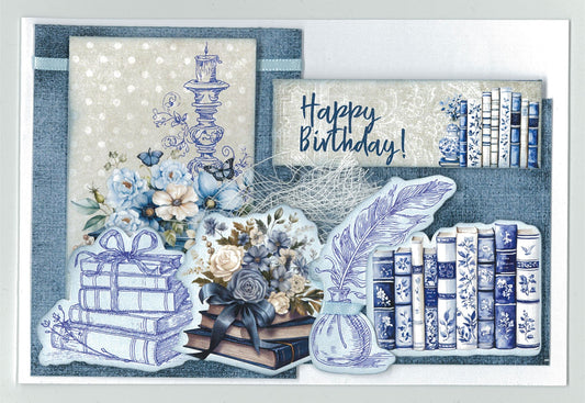 Twilight Ink 6x4 Card Making Kit by 3Quarter Designs — landscape Happy Birthday card with stacked books die-cuts, feather quill, ink pot, blue and white bookcase, floral bouquet on stacked books, and candlestick line art on midnight blue background