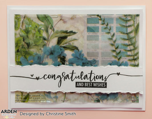 Handmade "Congratulations and Best Wishes" card sample using Arden Creative Studio Hidden Creek collection, featuring botanical patterned paper with teal floral and fern imagery, torn paper panel layers, silver staple embellishments, and a hand-lettered sentiment stamp.