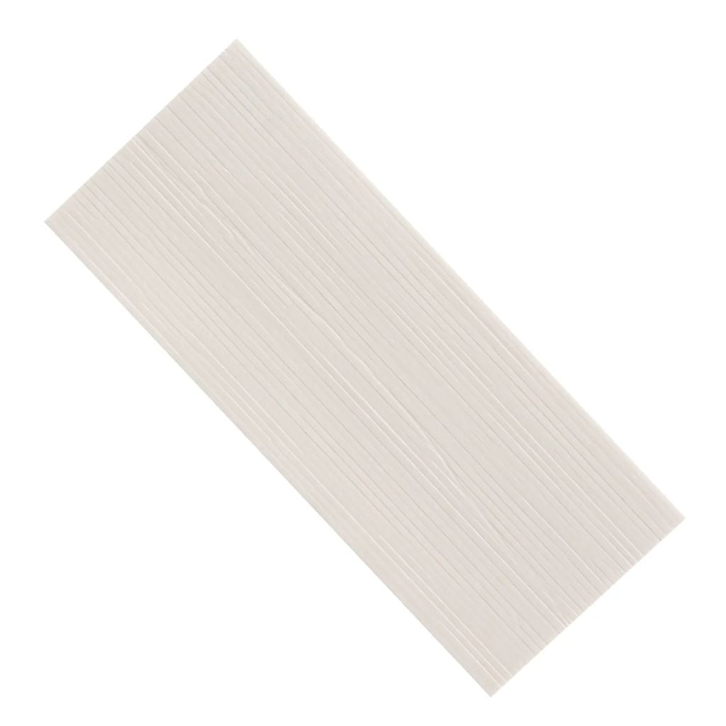 Sheet of white adhesive foam strips on a white background.