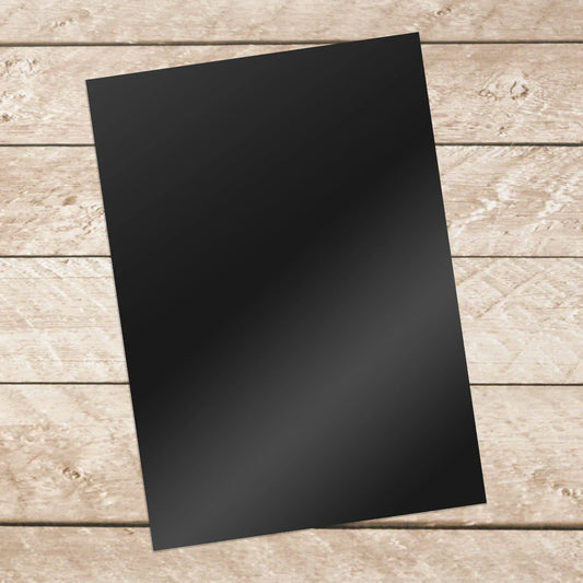 Couture Creations Adhesive Vinyl Black A4 single sheet on timber background