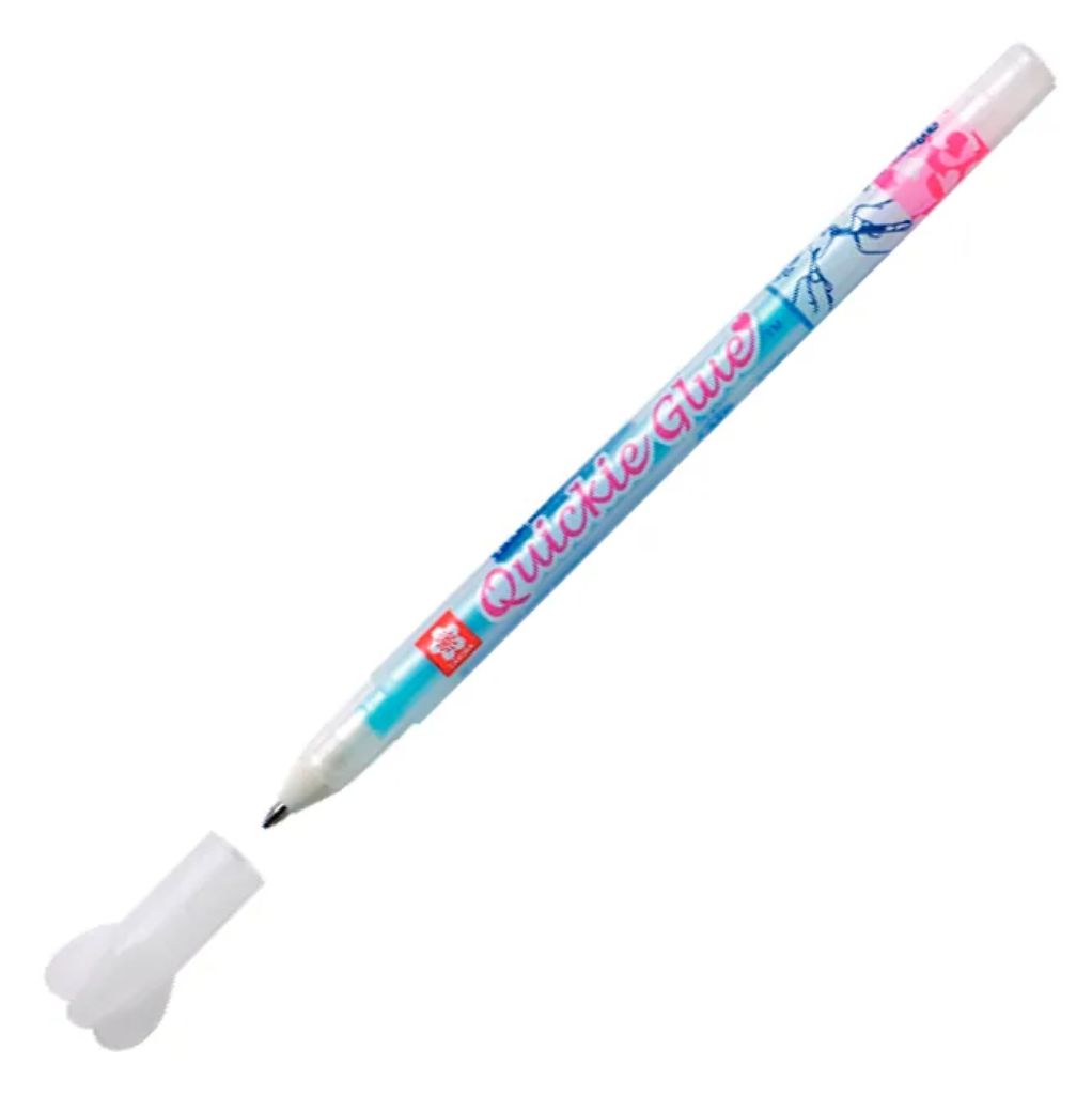 Sakura Quickie Glue Pen angled view showing fine tip applicator for detailed paper craft work