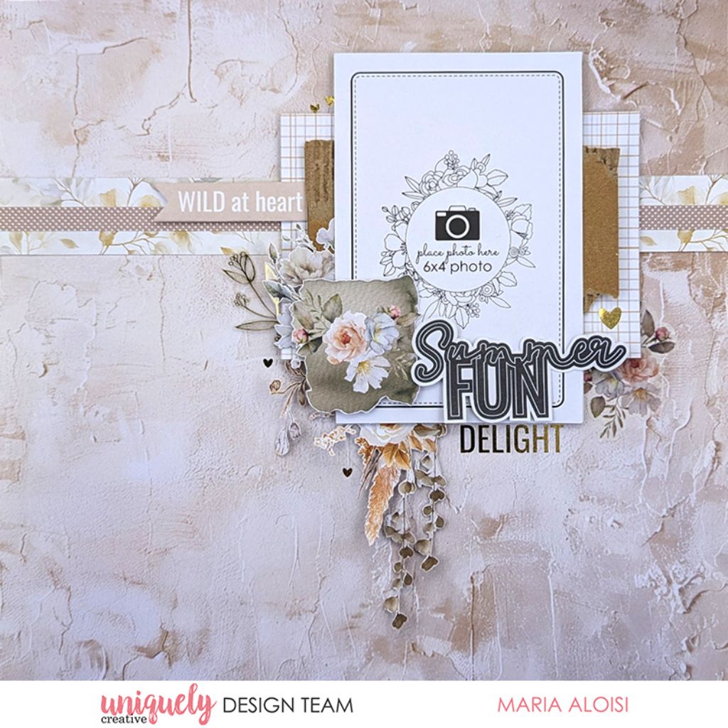 Scrapbook page by Maria Aloisi using Uniquely Creative Bohemian Escape collection – features a 6x4 photo place-holder surrounded by layered florals, textured papers, and sentiments like “WILD at heart” and “Summer FUN.” Soft beige background and artistic embellishments create a dreamy, nature-inspired summer memory.