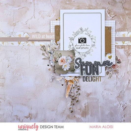 Scrapbook page by Maria Aloisi using Uniquely Creative Bohemian Escape collection – features a 6x4 photo place-holder surrounded by layered florals, textured papers, and sentiments like “WILD at heart” and “Summer FUN.” Soft beige background and artistic embellishments create a dreamy, nature-inspired summer memory.