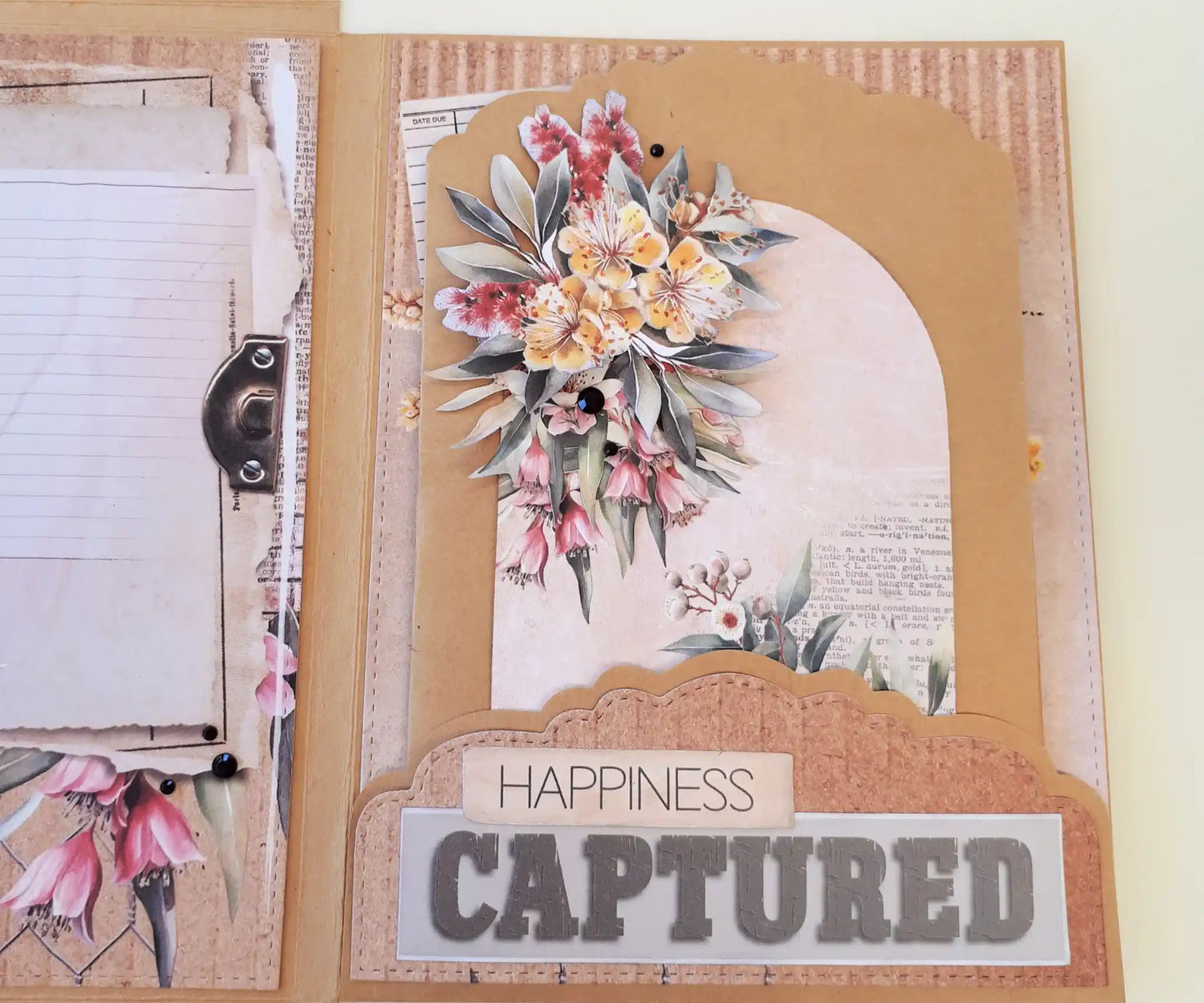 Open 6x8 Flip Folio Album interior showing die-cut scalloped and arch panels decorated with floral embellishments — design team sample