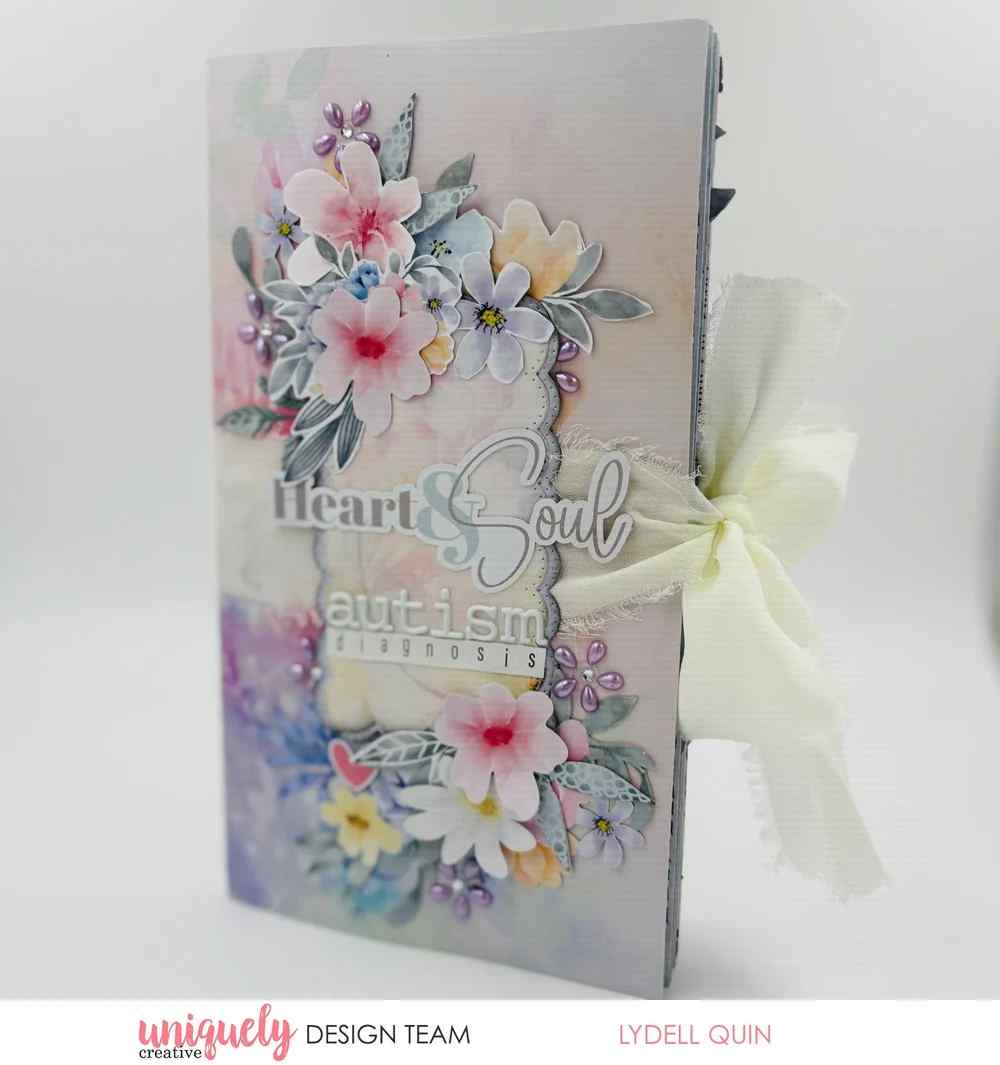 Uniquely Creative Moments that Matter Journal decorated with floral design and text on a white background