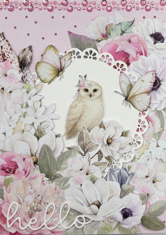 Handmade card using Uniquely Creative Delicate Doily Die with white doily frame, white owl, pink florals, butterflies and hello sentiment on soft pink floral background
