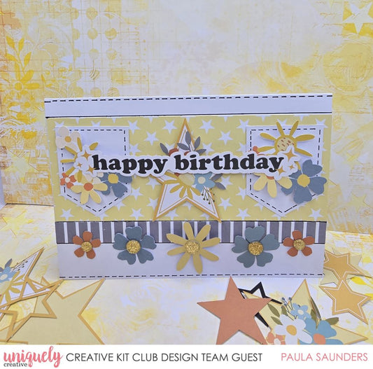 Happy birthday handmade card using Uniquely Creative Written in the Stars collection featuring yellow star pattern paper, grey striped accent, stitched banner pockets with floral clusters, star embellishments and gold glitter centres