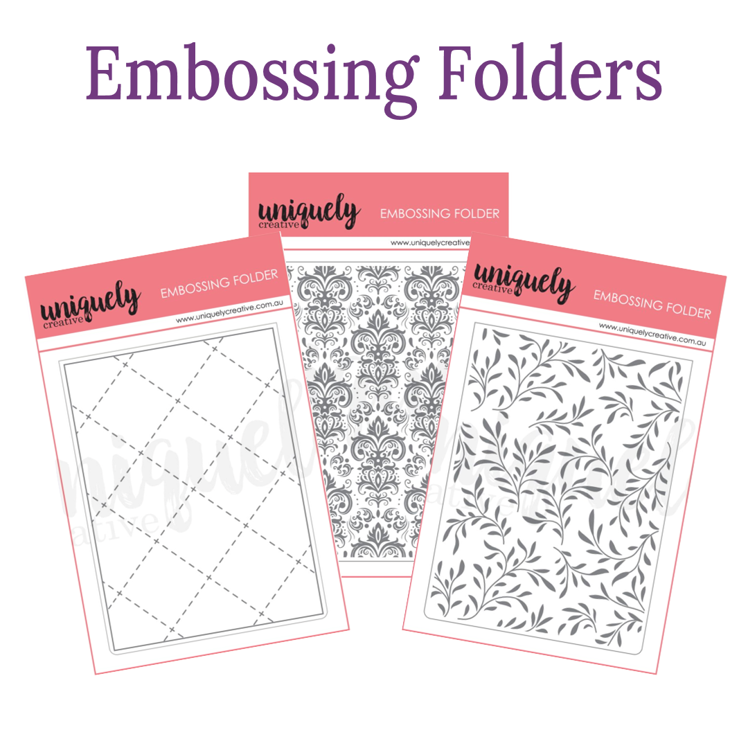Image shows embossing folders with patterns including a diagnoal cross, damask and leaves. 