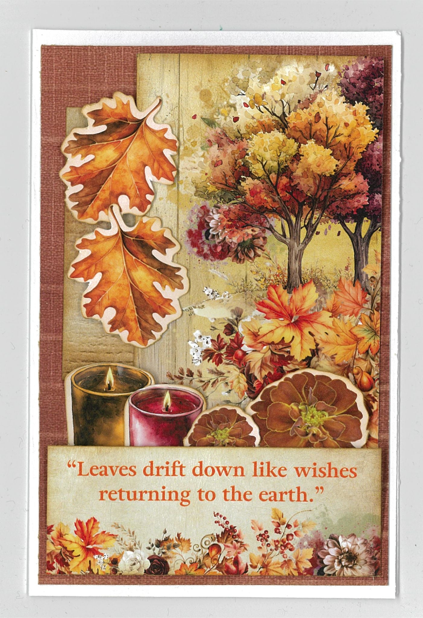 Autumn Whispers card sample 4 – portrait card with russet burlap background, oak leaf die-cuts, autumn tree, candles and dried florals with quote 'Leaves drift down like wishes returning to the earth'