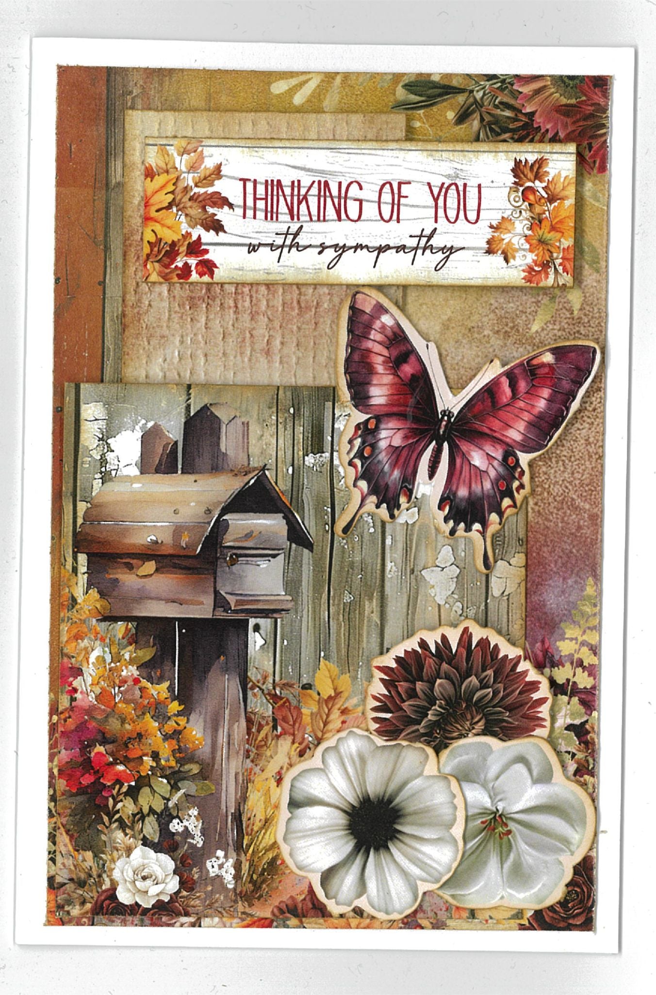 Autumn Whispers card sample 6 – portrait card with warm timber background, purple butterfly, rustic mailbox, white anemones and dark dahlia die-cut embellishments with sentiment 'Thinking of You with Sympathy'