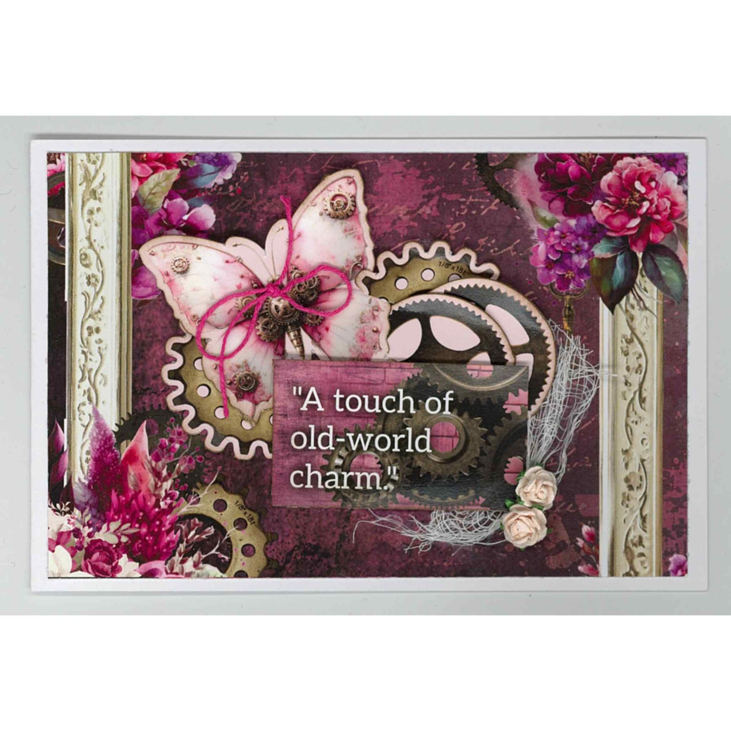 Handmade landscape card using Mrs Aeronaut kit with steampunk butterfly, brass gears, ornate cream frame and cerise florals, with A Touch of Old-World Charm sentiment on deep plum background