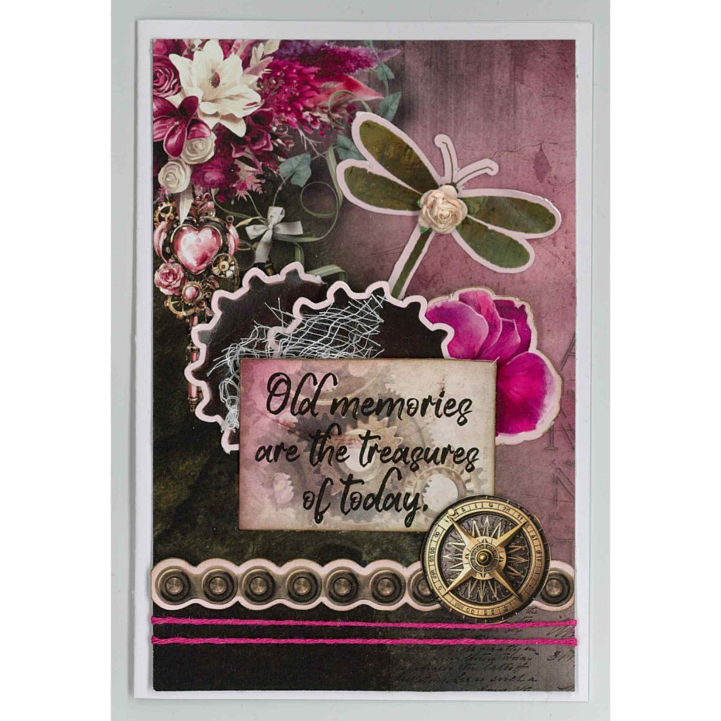Handmade portrait card using Mrs Aeronaut kit with dragonfly, heart locket, brass key, brass compass and mixed white and cerise florals, with Old Memories Are the Treasures of Today sentiment on dark plum background