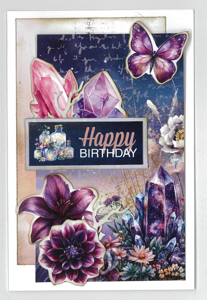 Birthday card with “Happy Birthday” message, embellished with colourful crystals, potion bottles, and flowers, crafted from the Night Garden cardmaking kit.