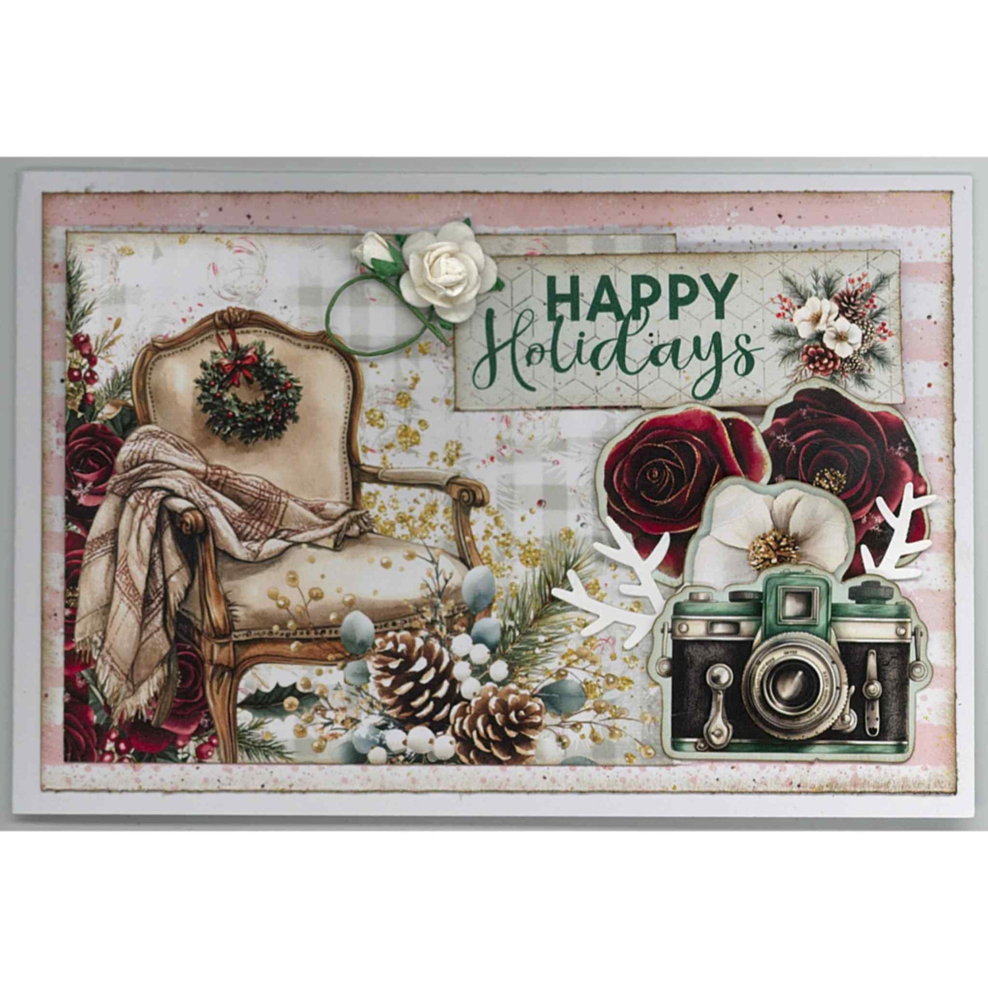 Handmade Silent Night Christmas card featuring cream armchair with tartan throw and wreath, vintage camera, burgundy and cream roses, pine cones, white paper flower and Happy Holidays sentiment on pink stripe background