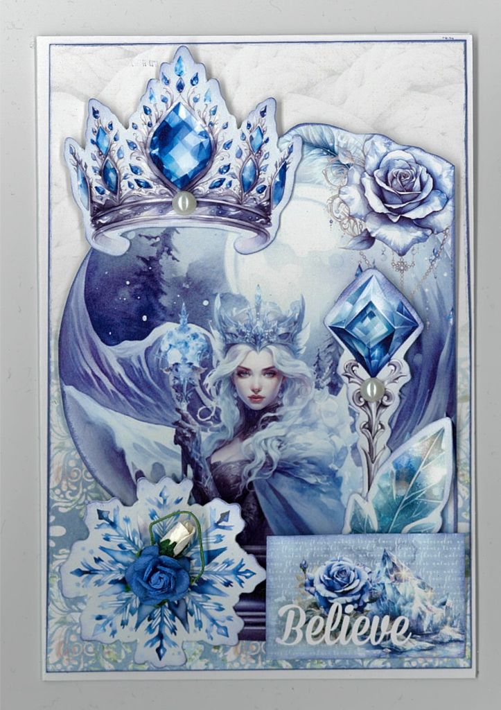 Fantasy winter artwork featuring regal woman, crown, snowflake, and “Believe” sentiment on a handmade card. 