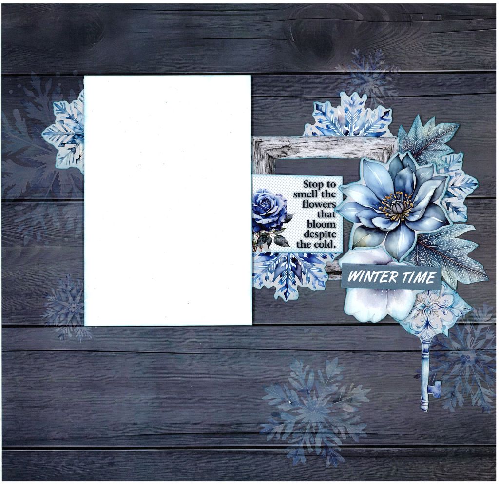 Winter-themed scrapbook layout with dark wood background, floral collage, and quote “Stop to smell the flowers…”