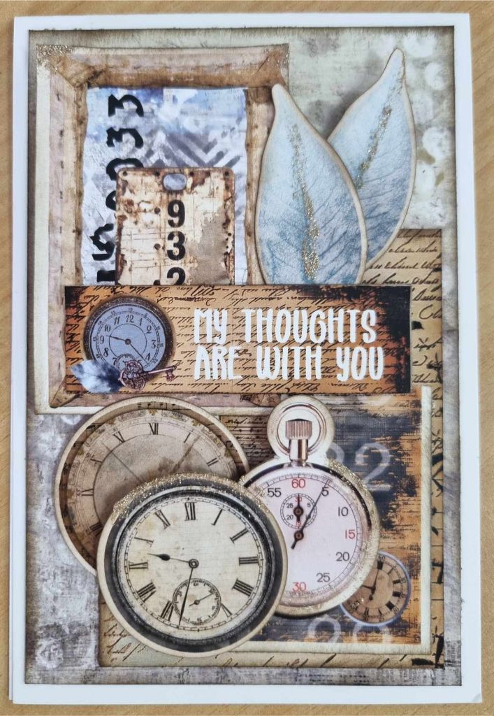 Eclectic Clockwork My Thoughts Are With You card with vintage clocks, blue leaves and layered paper panels