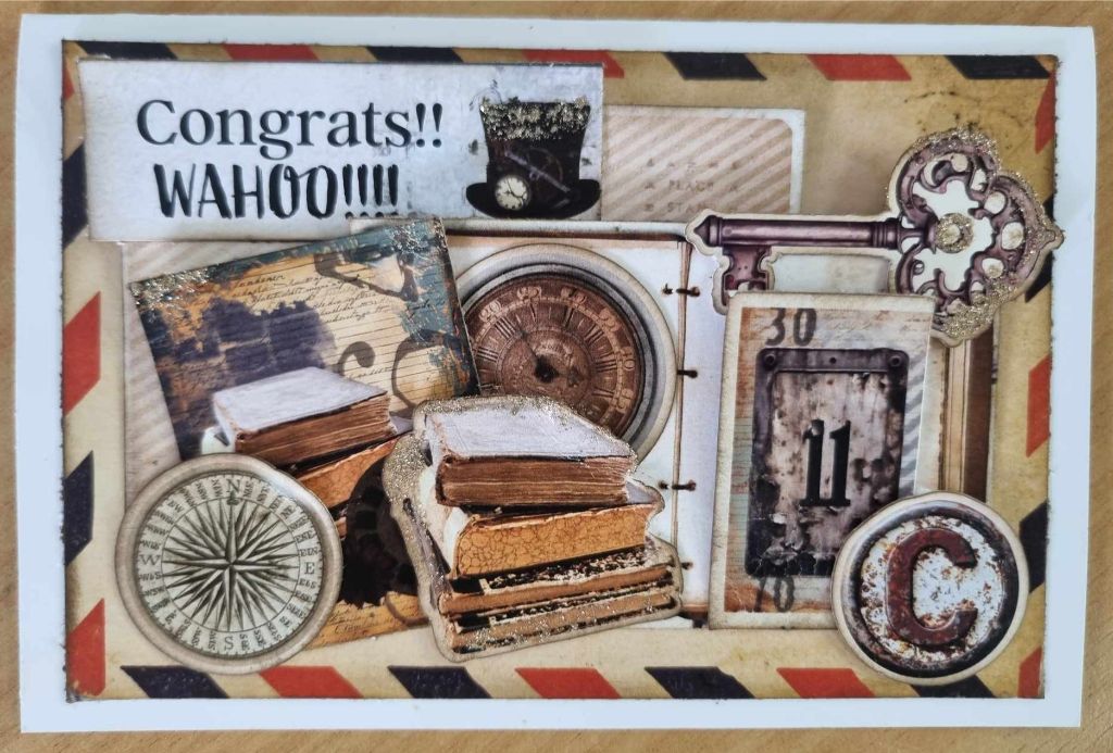 Eclectic Clockwork Congrats Wahoo card with old books, compass, clock, key and airmail border