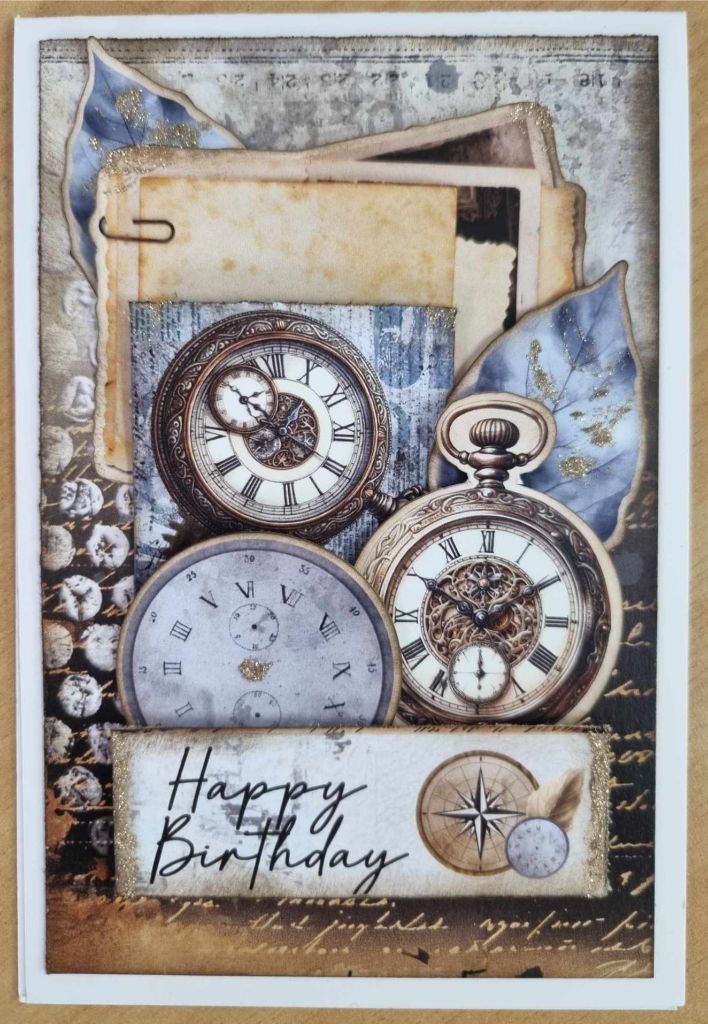 Eclectic Clockwork Happy Birthday card with three layered clocks, blue leaves and aged papers
