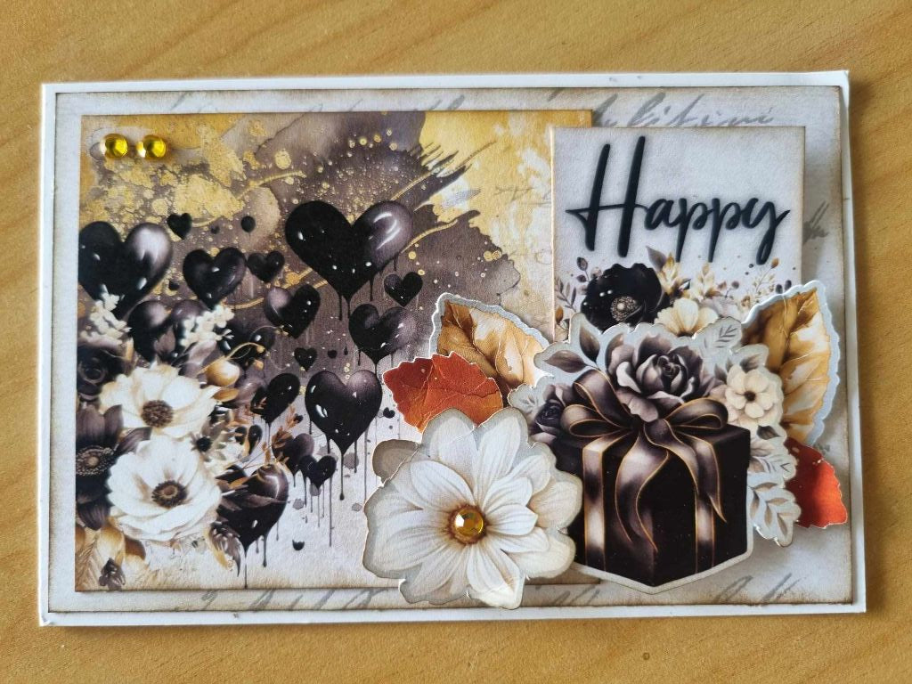 Golden Ebony Happy sample card with black hearts, white flowers and a rose-topped gift box