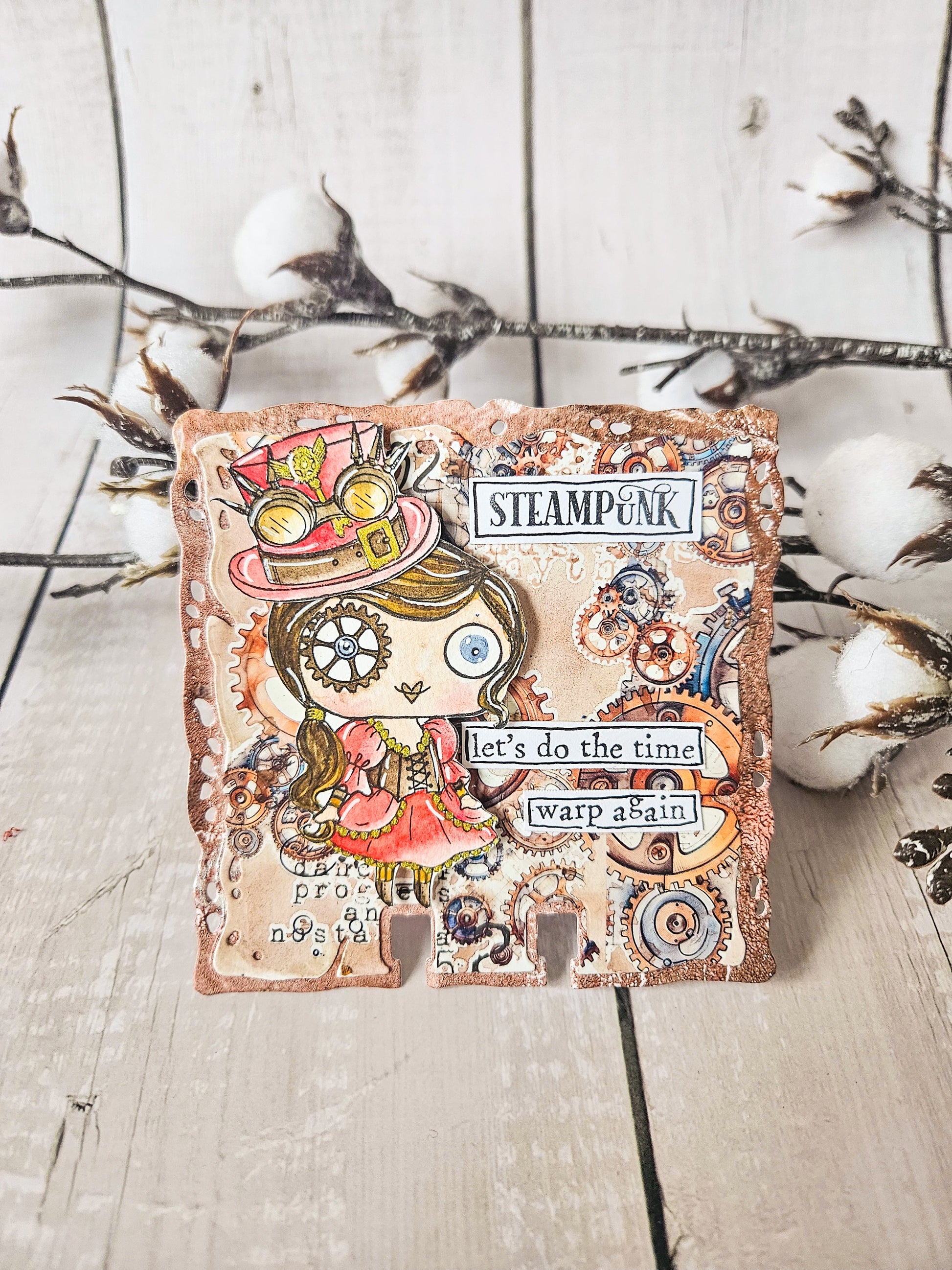 Steampunk index card made with AALL & Create Cogs & Curios rub-ons featuring cute character in top hat, coral and turquoise gears, 'Let's do the time warp again' sentiment on distressed white wood background