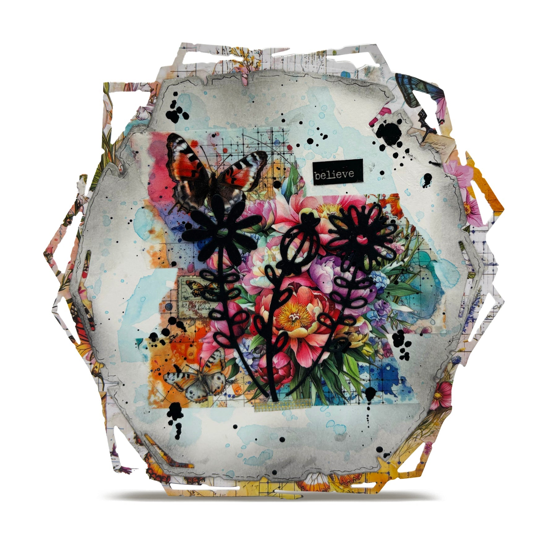 'Believe' mixed media hexagon canvas made with AALL & Create Floral Fantasy dies featuring black die-cut flowers layered over vibrant watercolour florals, butterflies, and vintage ephemera with turquoise and pink tones