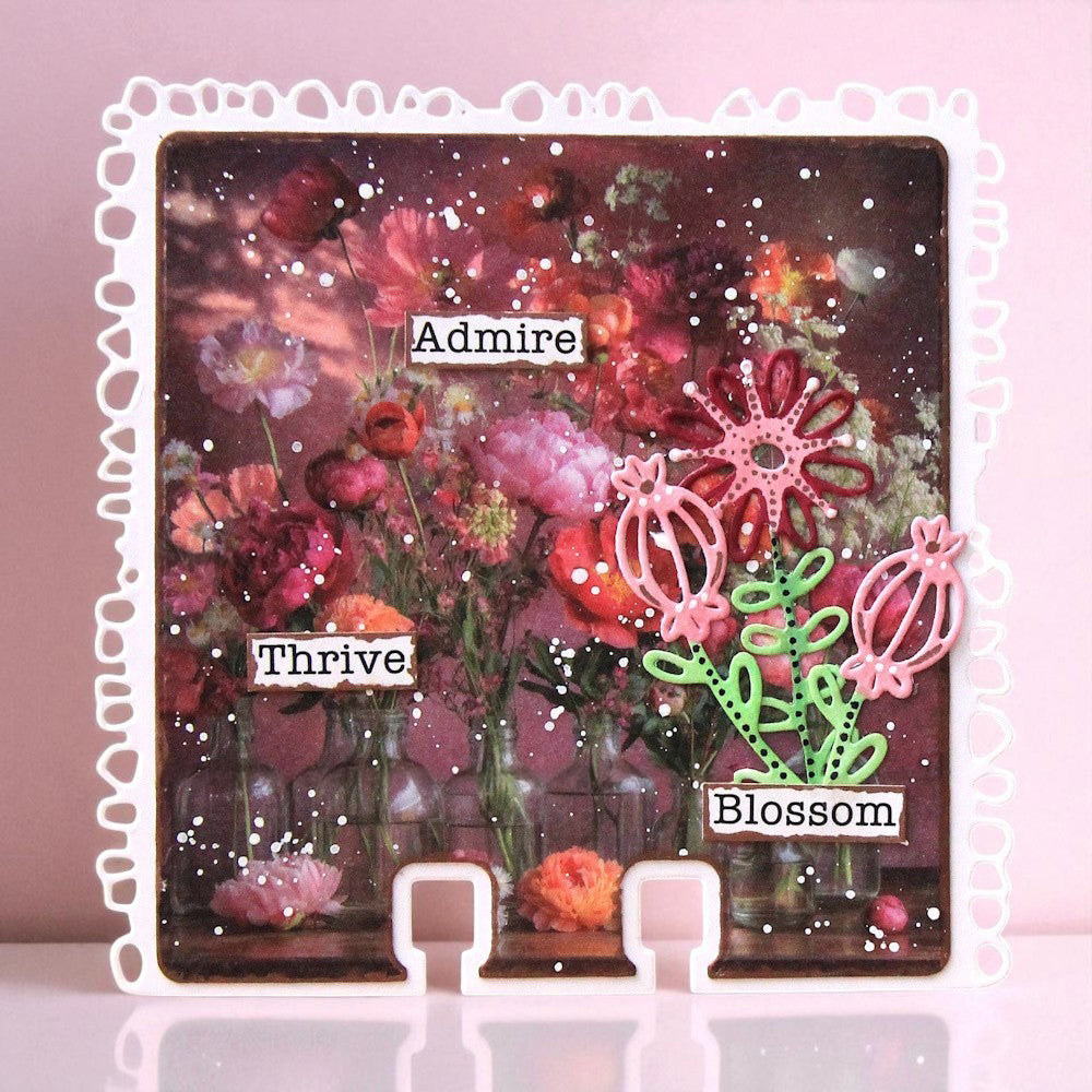 'Admire Thrive Blossom' index card made with AALL & Create Floral Fantasy dies in pink and lime green, layered over dreamy burgundy floral photography background with white splatter and decorative die-cut border