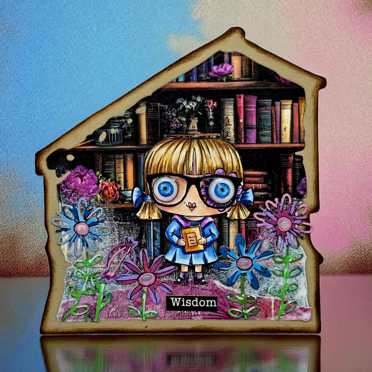 'Wisdom' house-shaped card made with AALL & Create Floral Fantasy dies in blue and purple featuring character with glasses in library setting, dimensional die-cut flowers with distressed ink-stained edges