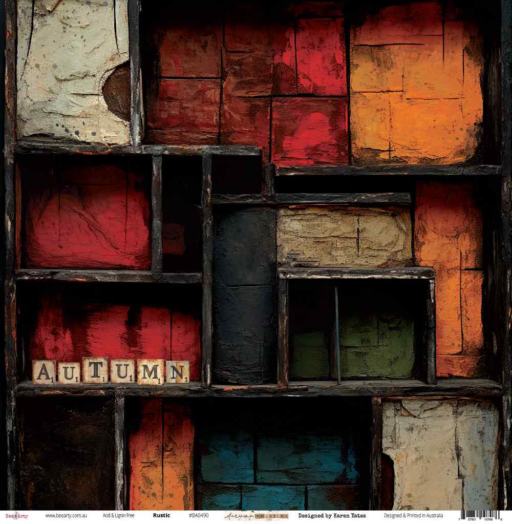 Front side of Bee Arty Rustic 12x12 paper featuring a vintage printer's tray design with bold distressed colour blocks in crimson, orange, teal, and olive, with AUTUMN scrabble letter tiles, from the Autumn Whispers collection by Karen Yates