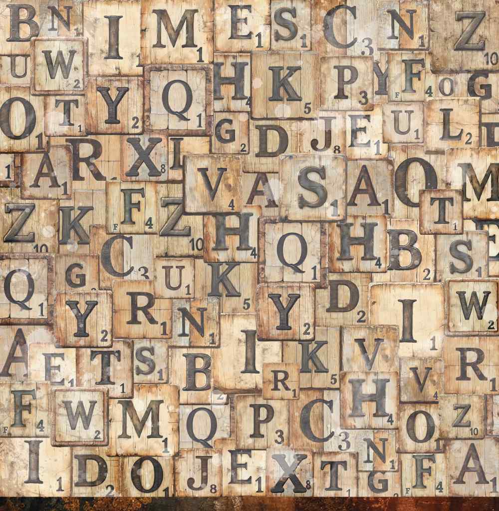 Reverse side of Bee Arty Rustling 12x12 paper featuring a bold all-over wooden scrabble-style letter tile collage in sandy cream and warm tan tones, from the Autumn Whispers collection by Karen Yates