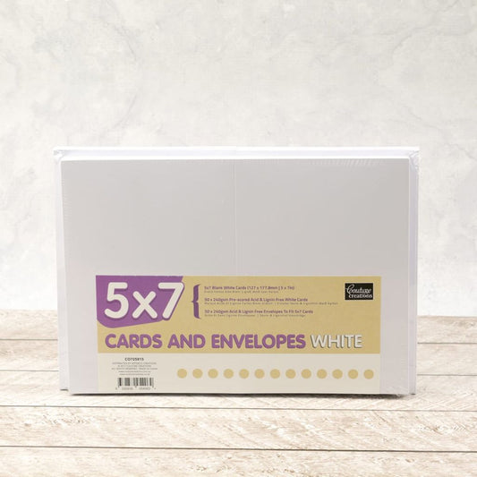 Packet of 5x7" white cards and envelopes on a wooden surface with a white background