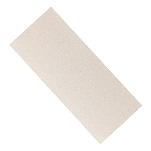 3D Foam adhesive dots in a sheet on a white background. 