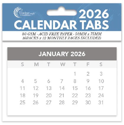 Couture Creations 2026 calendar tabs showing January month with full calendar grid on blue header, acid-free paper