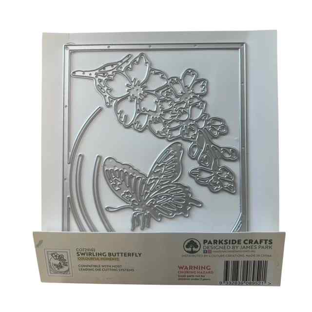 Reverse view of the Swirling Butterfly packaging showing the steel dies for a curved frame, flowering branch and detailed butterfly