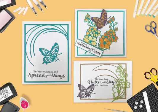 Three handmade cards made with the Swirling Butterfly die set, showing a butterfly, floral cluster, curved border and the sentiments Sending Butterfly Kisses, Embrace Change and Spread your Wings, and May your Days Flutter with Joy and Happiness