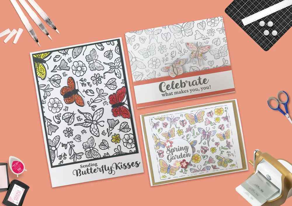 Three handmade cards showing the Fluttering Background stamp design with butterflies, flowers and garden motifs, including Sending Butterfly Kisses, Celebrate What makes you, you! and Spring Garden cards