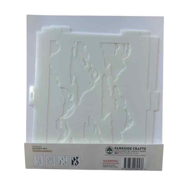 Reverse view of the Cloudy Sky stencil packaging showing the four stacked stencil layers and cloud design stages
