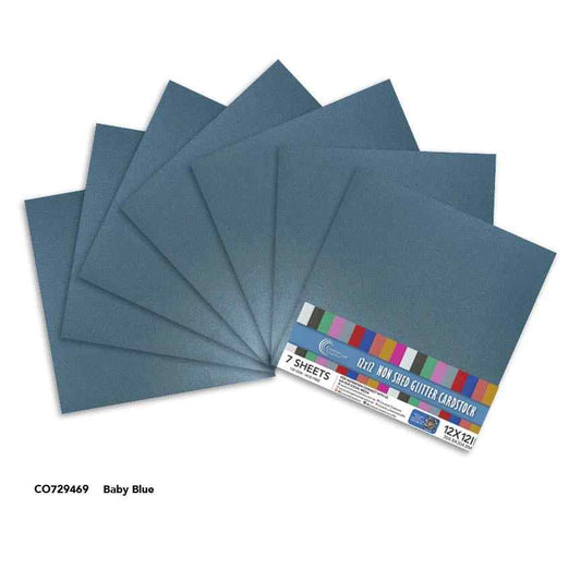 Couture Creations Baby Blue 12x12 glitter cardstock sheets displayed with product packaging