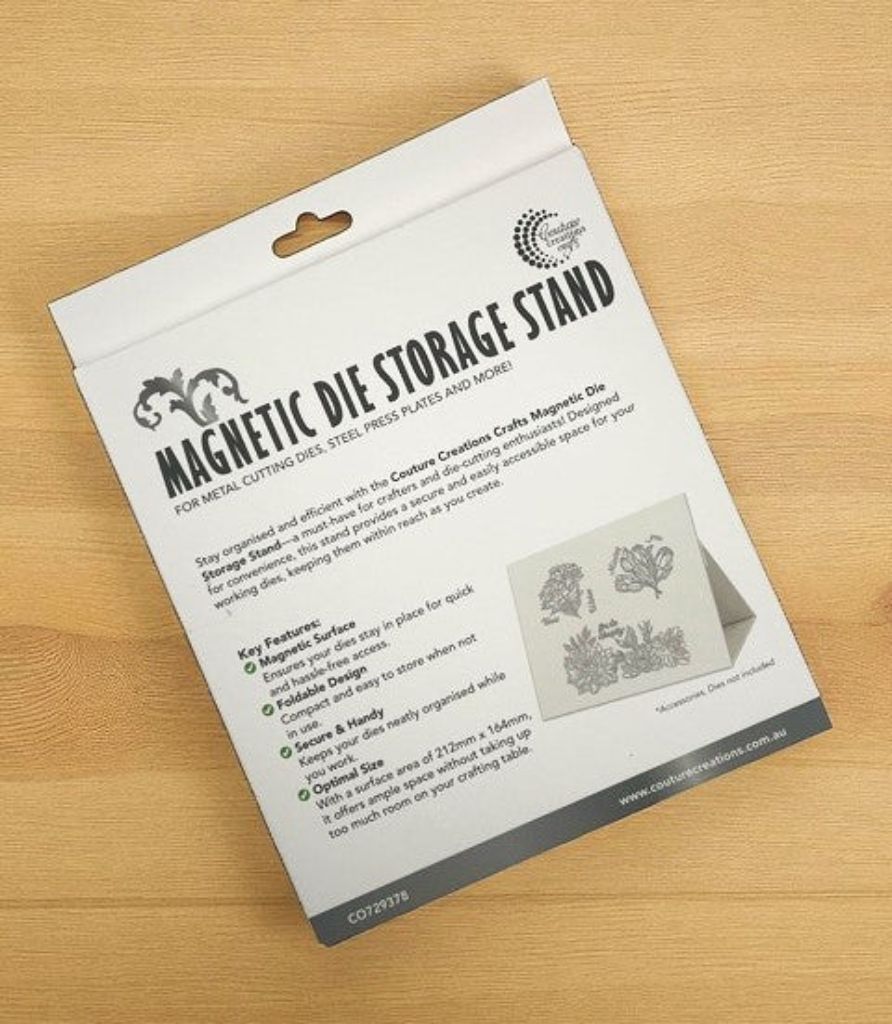 Packaging of a magnetic die storage stand on a wooden surface