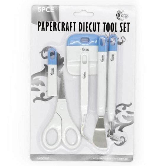 Papercraft die-cut tool set packaging with scissors and paper craft tools on a white background