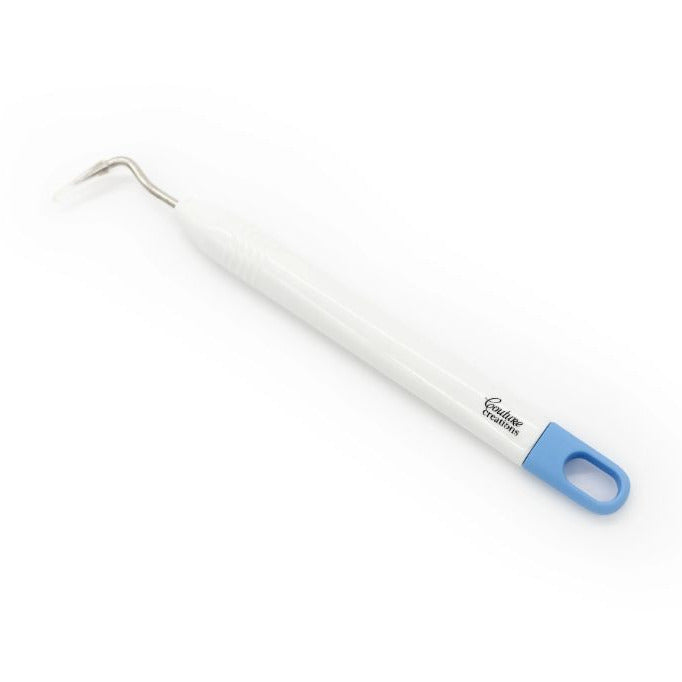 White weeding tool with a blue end on the handle. 