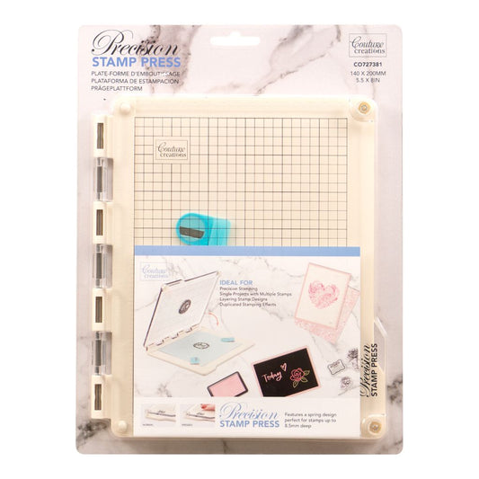 Precision Stamp Press packaging with the stamp press shown in use on a white background. 