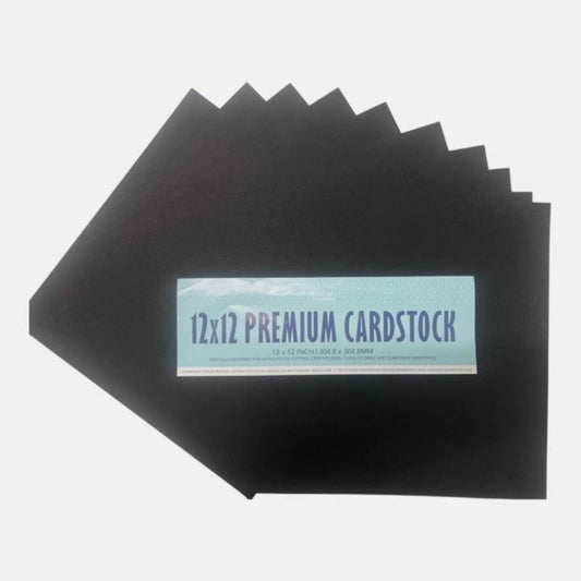 Stack of 12x12 premium black cardstock sheets on a white background