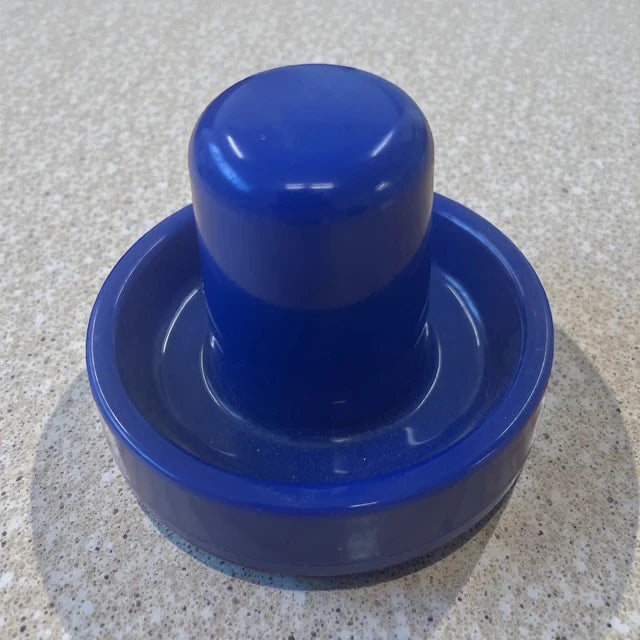 Couture Creations Stamp Pressing Tool blue presser on granite surface showing profile and felt base