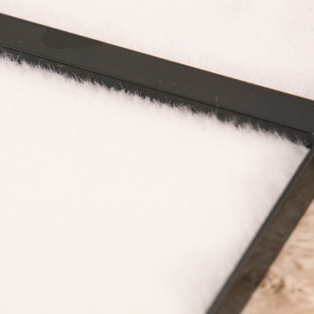 Close-up of a stamp scrubber surface inside