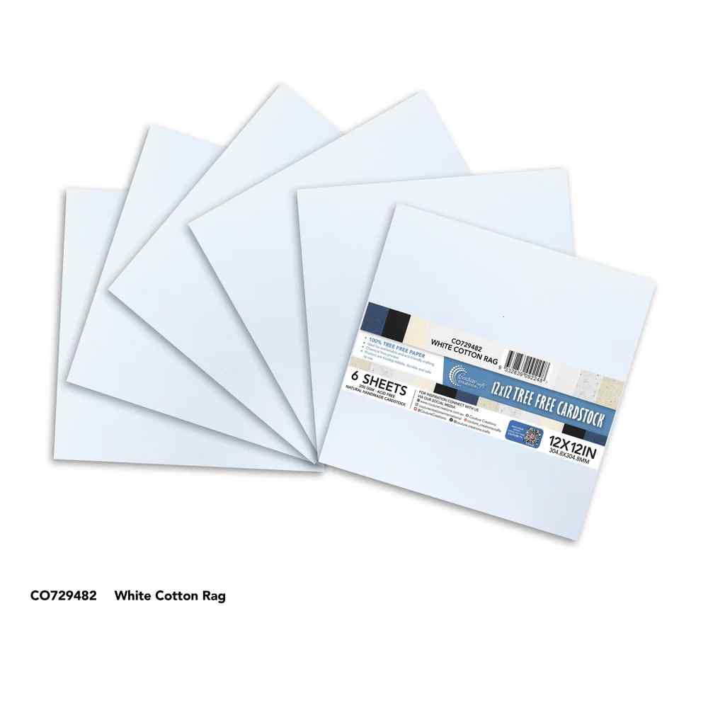 Couture Creations White Cotton Rag Tree Free Cardstock sheets fanned beside the product packaging