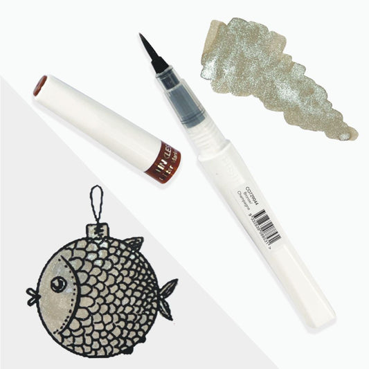 Pale Bronze Winkles Glitter Marker, ink sample, and fish-shaped stamp coloured on a white background