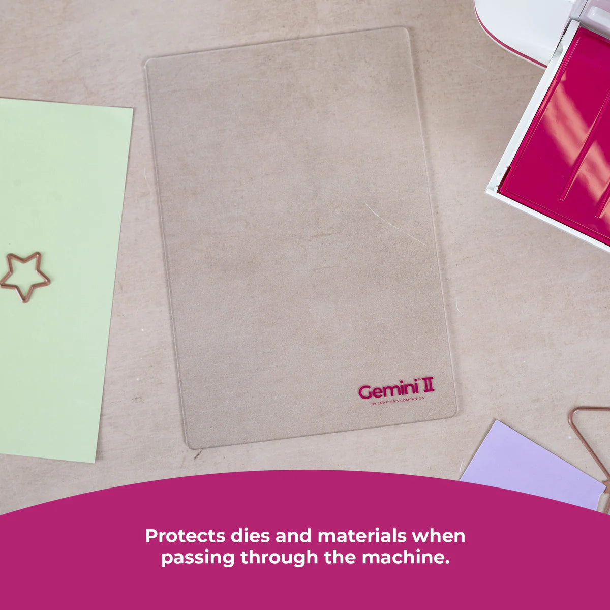 Crafter's Companion Gemini II plastic shim on craft table with die-cut star and Gemini II die-cutting machine.