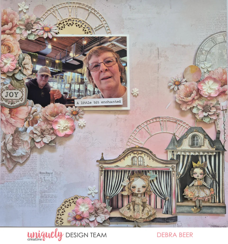 Dressed in Daydreams scrapbook layout featuring Paper Theatre ephemera with fairy characters, vintage clock faces, watercolour florals and photo mat by Debra Beer for Uniquely Creative 